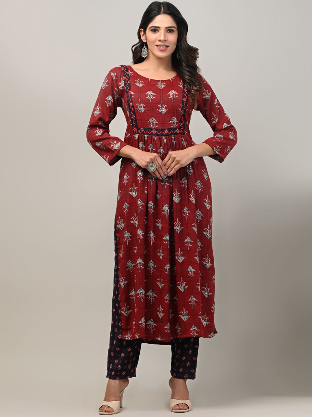 

DHRTI Women Maroon Ethnic Motifs Printed Pleated Kurta with Trousers