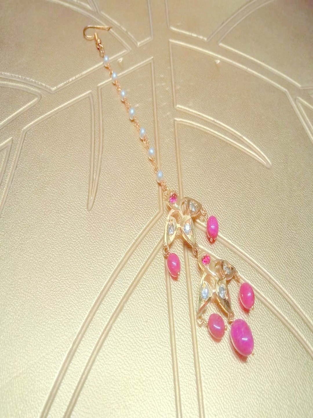 

Runjhun Gold-Plated Pink & White Artificial Stone Studded Traditional Maang Tikka