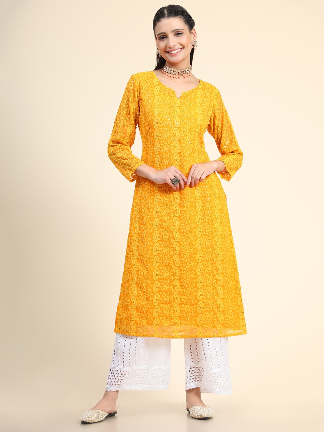 

KALINI Women Orange Ethnic Motifs Embroidered Chikankari Georgette Kurta