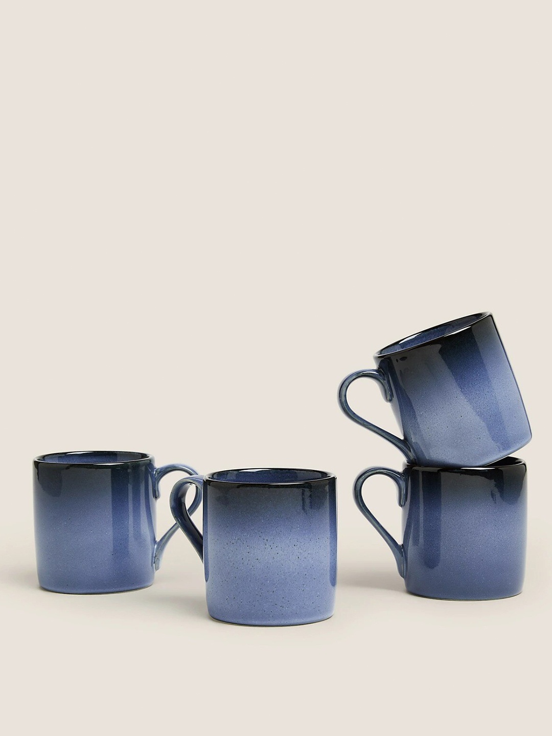 

Marks & Spencer Blue & Black Set Of 4 Dish washer And Microwave Safe Porcelain Glossy Mugs