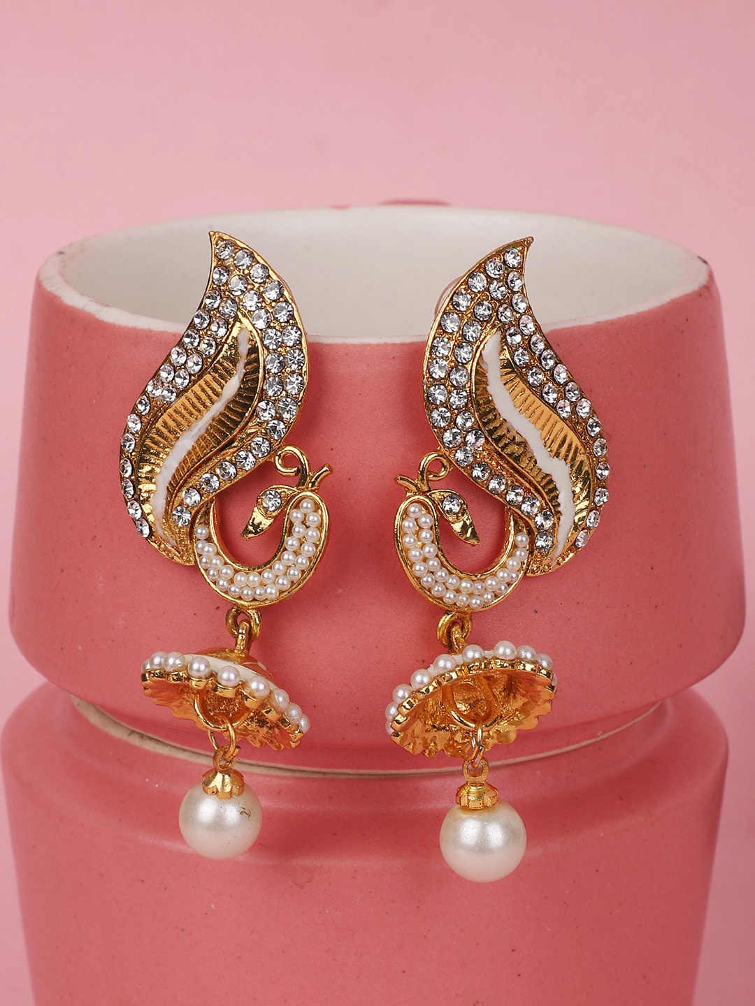 

ANIKAS CREATION Women Gold Plated White & Off White Peacock Shaped Jhumka Earrings