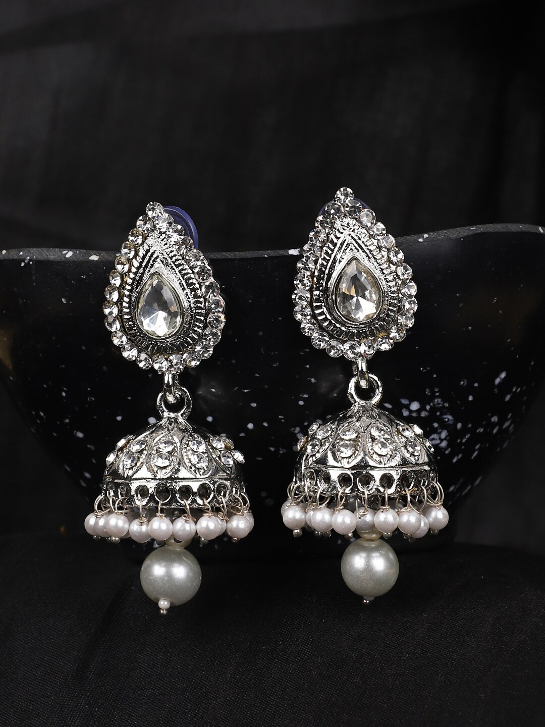 

ANIKAS CREATION Silver-Plated Contemporary Jhumkas Earrings