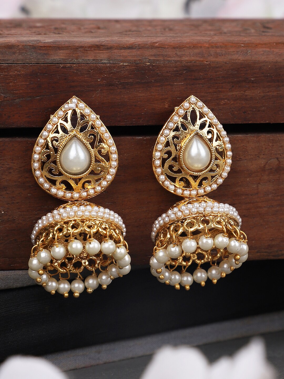 

ANIKAS CREATION Off White Gold-Plated Contemporary Jhumkas Earrings