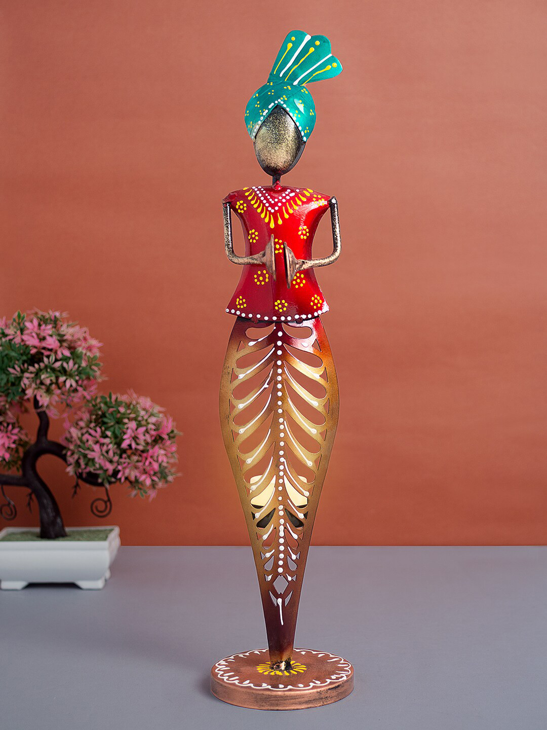 

Golden Peacock Red & Gold-Toned T-Light Figurine Candle Holder