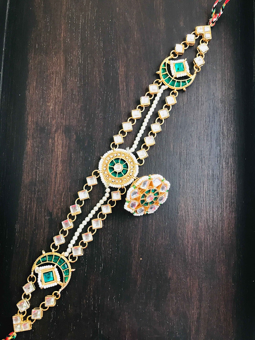

The Opal Factory Gold-Plated White Stone-Studded & Beaded Sheeshphool