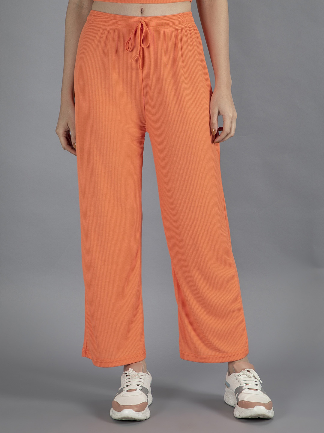 

NEUDIS Women Orange Solid Track Pants
