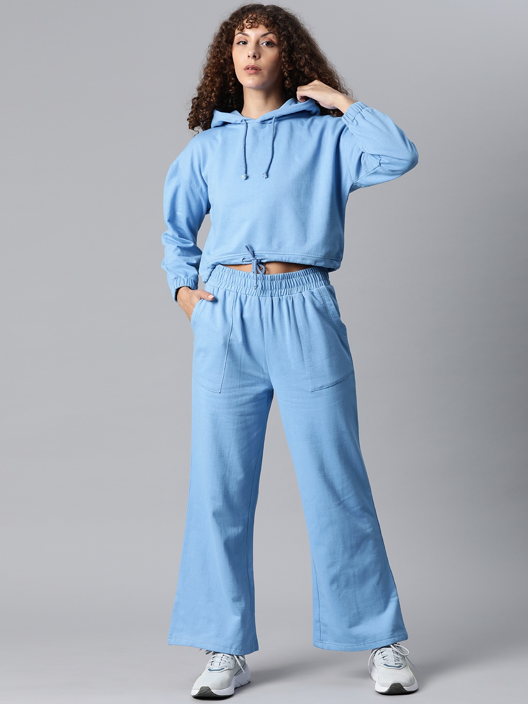 

Laabha Women Blue Solid Hooded Tracksuit