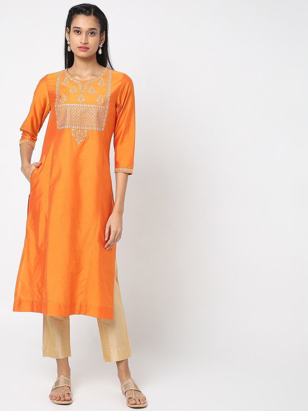

Ethnicity Women Orange Ethnic Motifs Yoke Design Flared Sleeves Thread Work Kurta