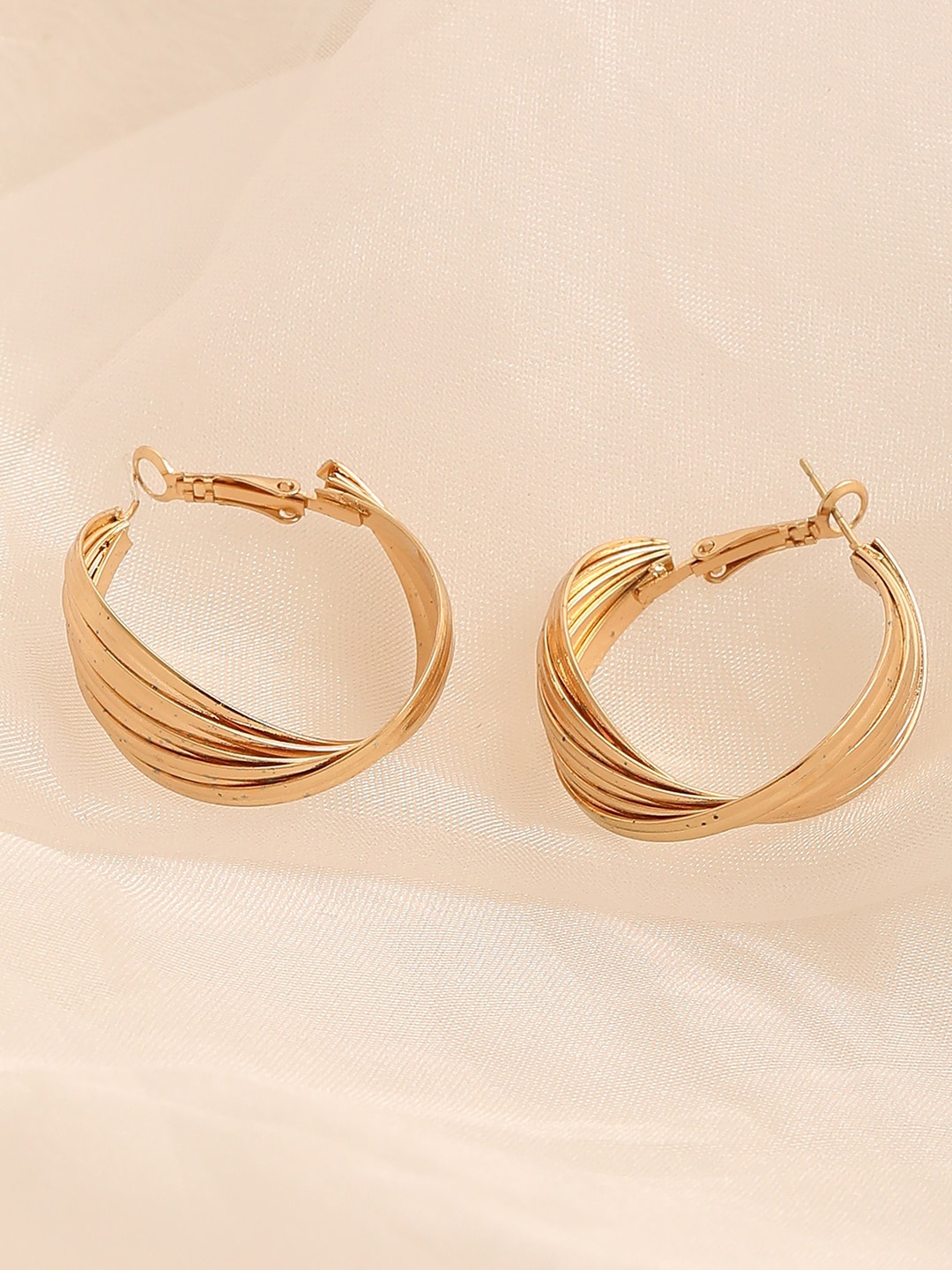 

SOHI Gold-Toned Contemporary Drop Earrings