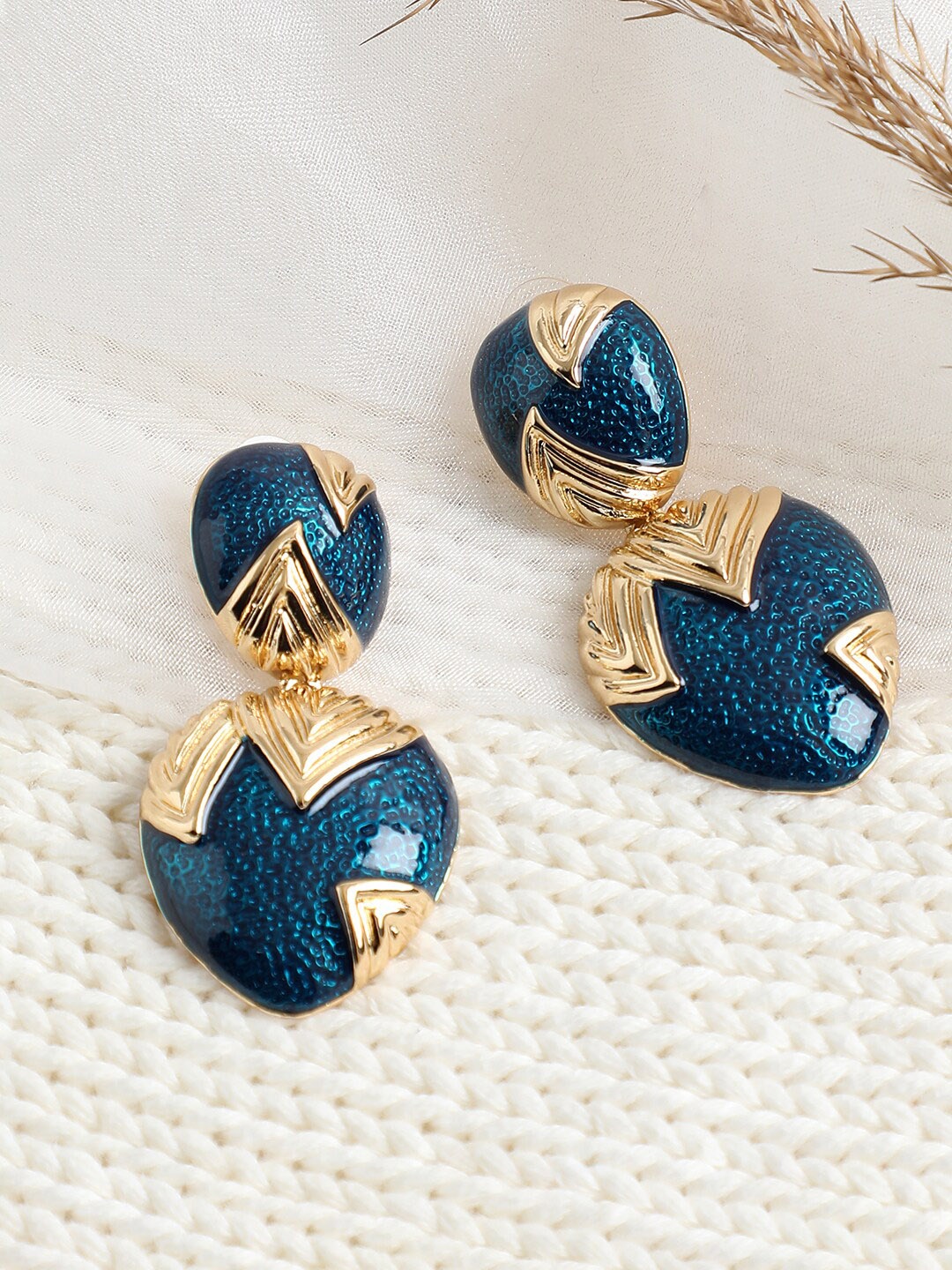 

SOHI Blue Contemporary Studs Earrings
