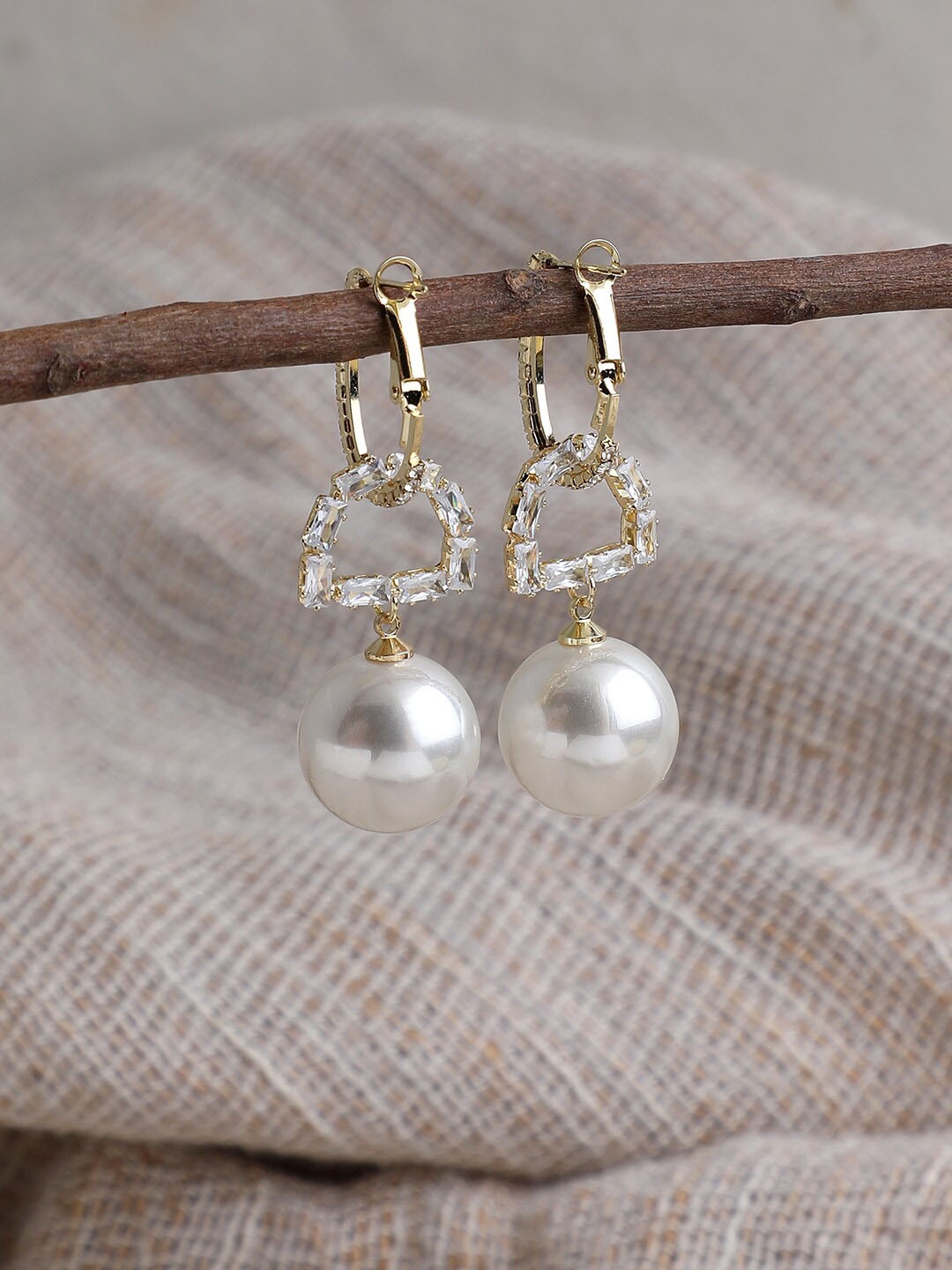 

SOHI Gold-Plated White Contemporary Drop Earrings