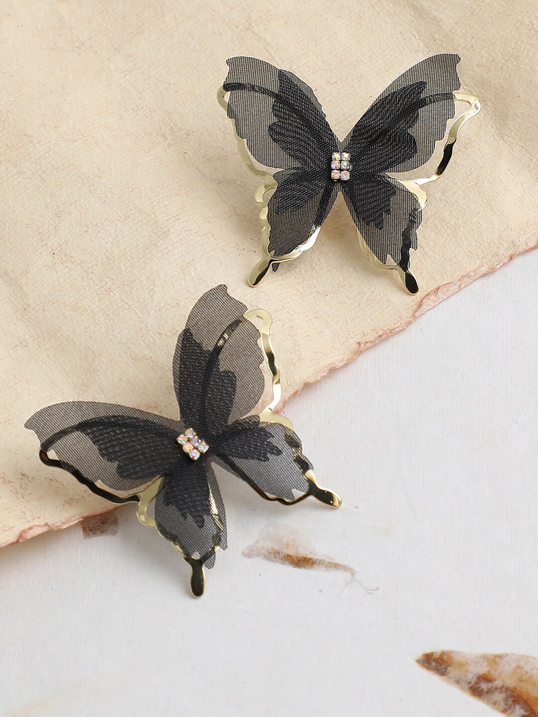 

SOHI Black Contemporary Studs Earrings