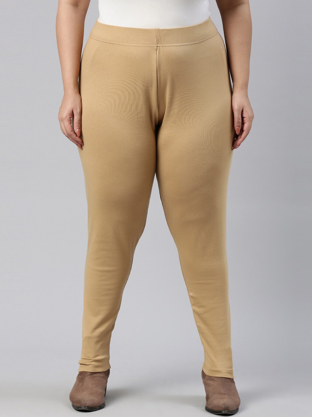 

Go Colors Women Cream Solid Ankle-Length Ribbed Warm Leggings.