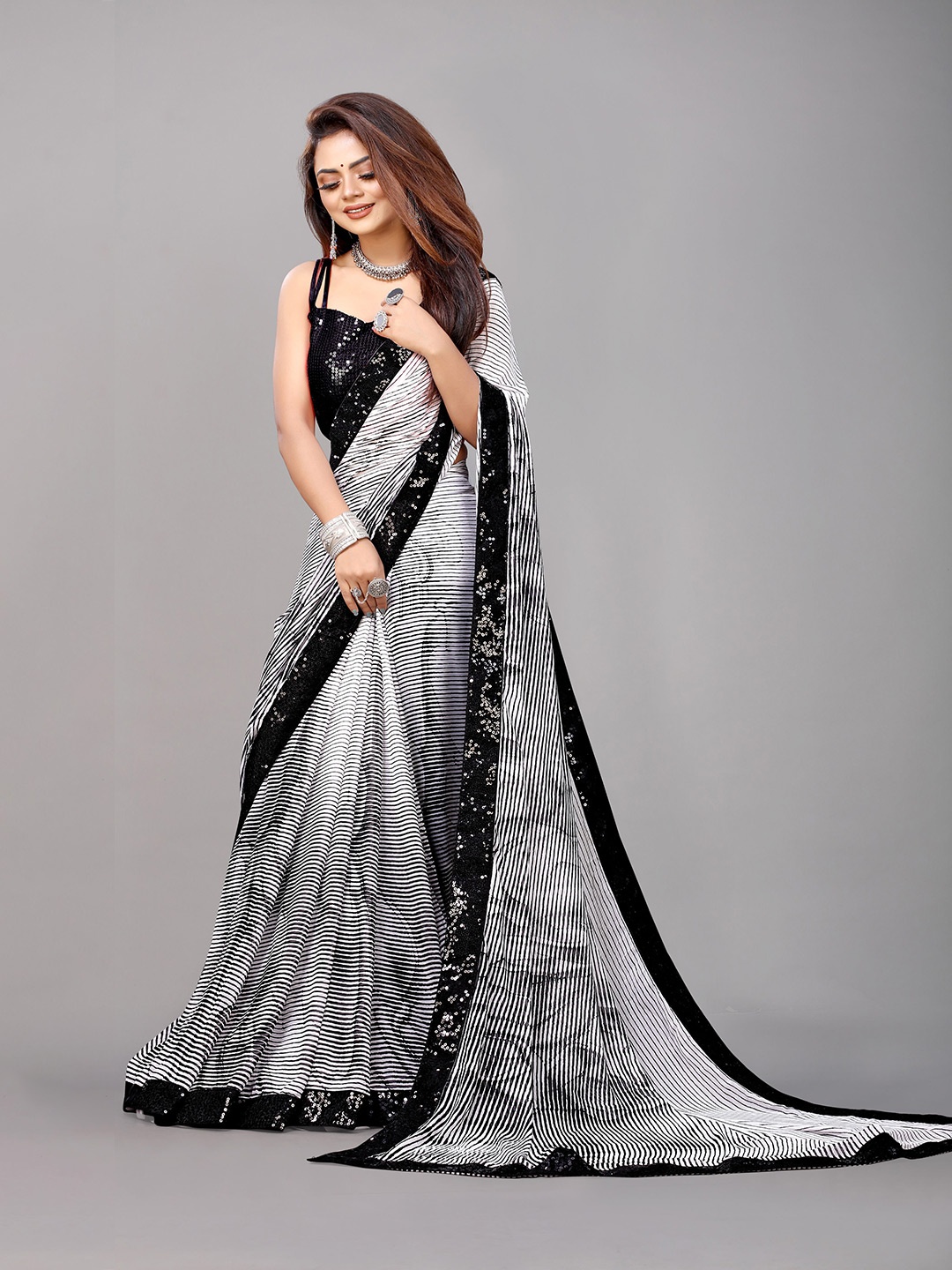 

B4ME COM White & Black Striped Sequinned Pure Georgette Saree