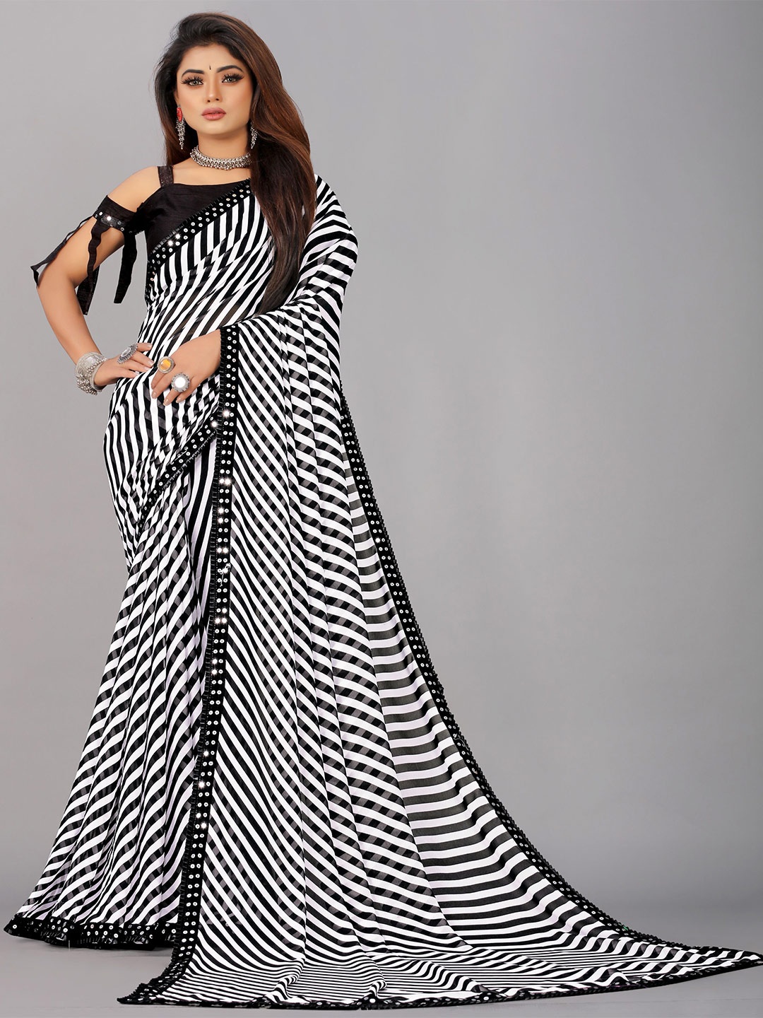 

B4ME COM Black & White Leheriya Printed Pure Georgette Saree