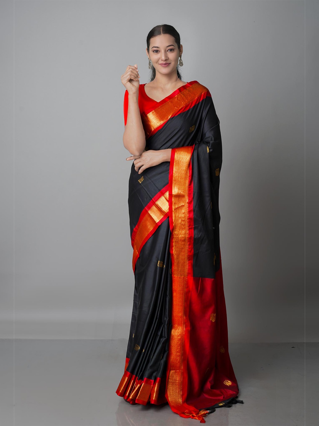 

Unnati Silks Black & Red Woven Design Zari Silk Blend Kanjeevaram Saree