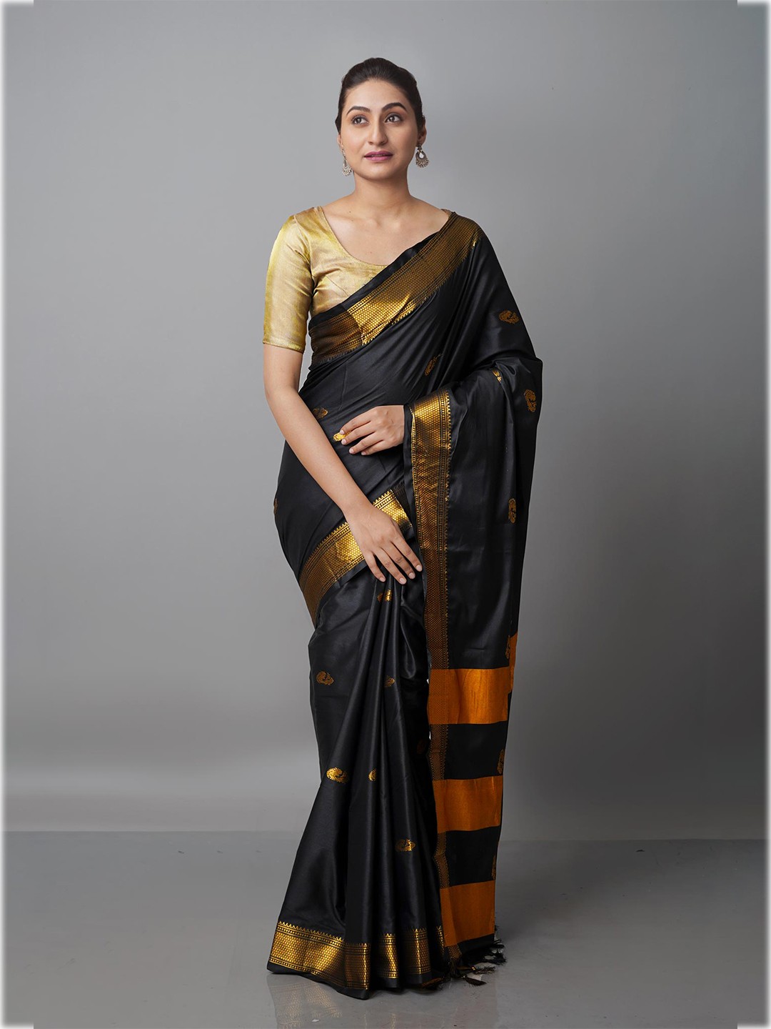 

Unnati Silks Black & Gold-Toned Woven Design Zari Silk Blend Ready to Wear Kanjeevaram Saree