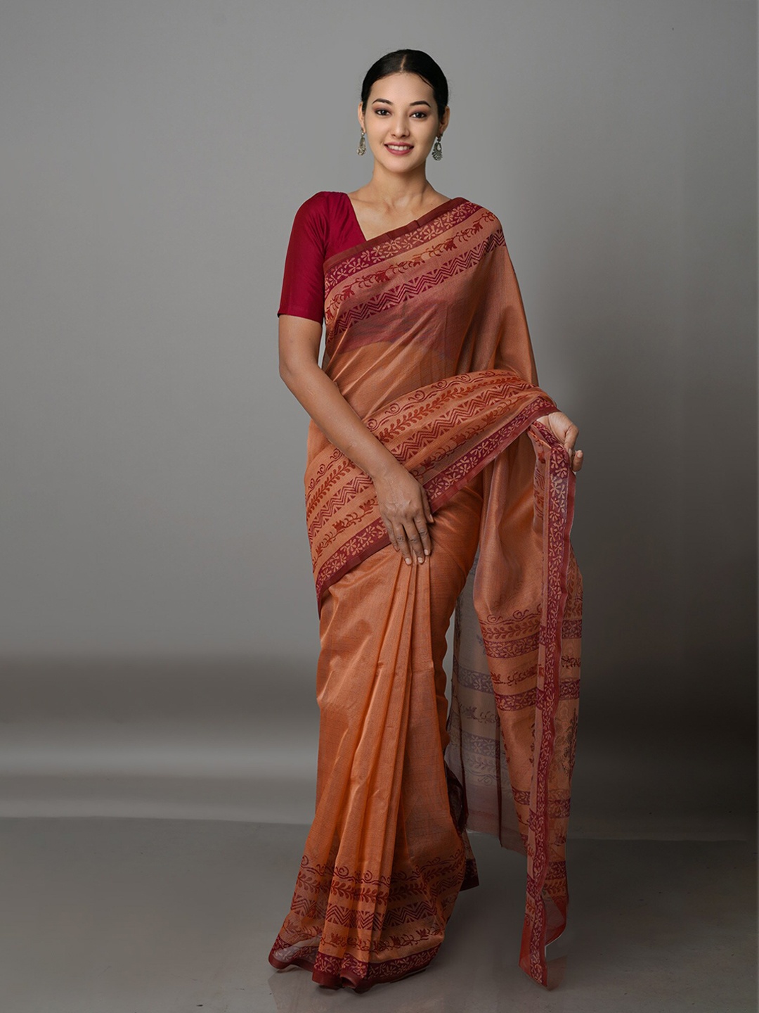 

Unnati Silks Orange & Maroon Ethnic Motifs Silk Cotton Block Print Saree