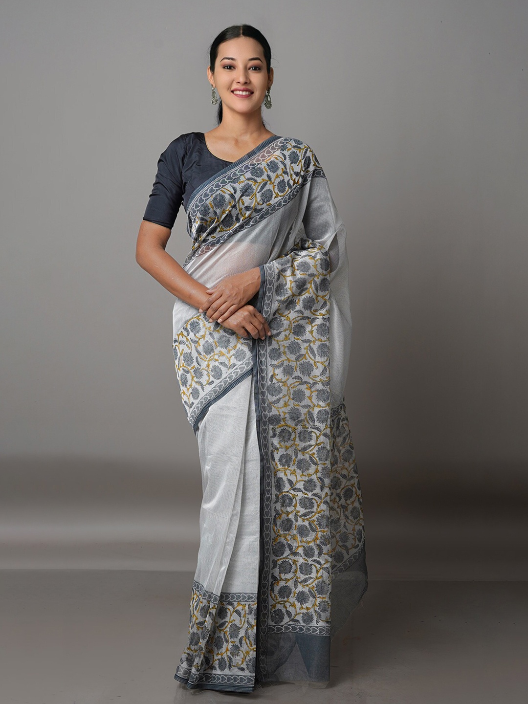 

Unnati Silks Grey Melange & Green Floral Silk Cotton Block Print Saree