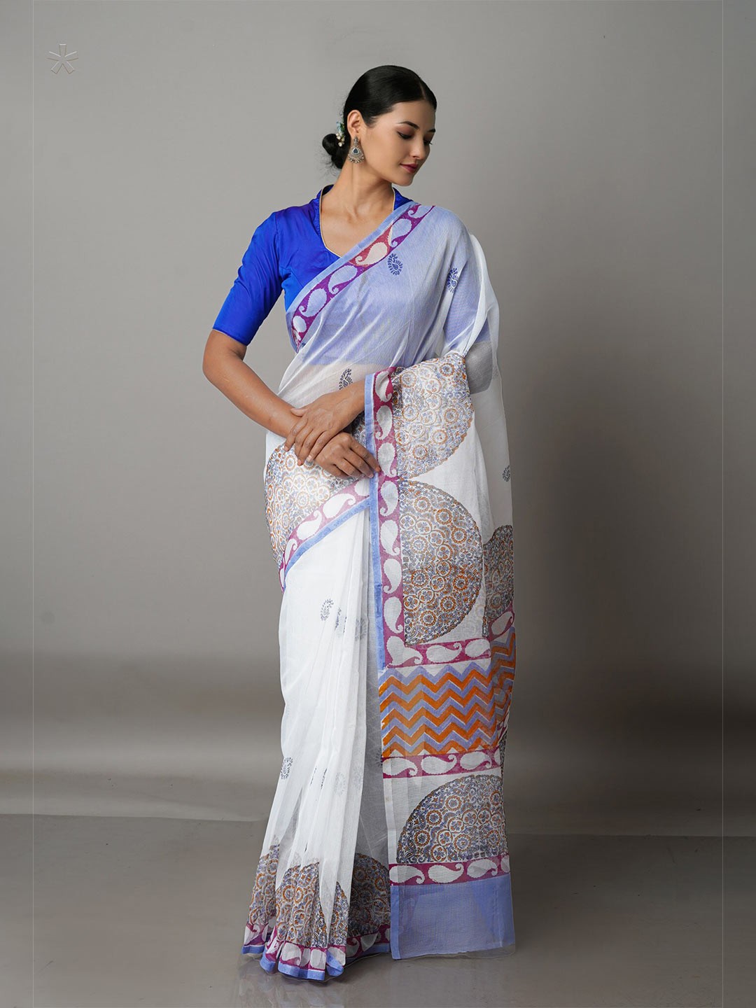 

Unnati Silks White & Blue Ethnic Motifs Silk Cotton Block Print Saree