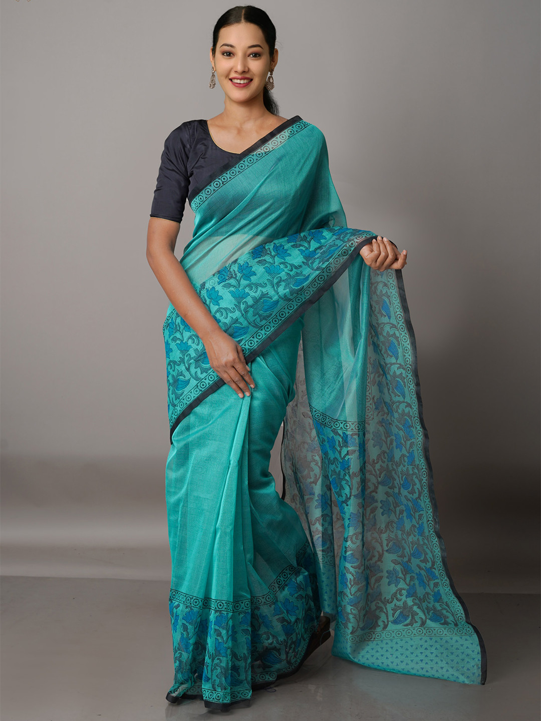 

Unnati Silks Turquoise Blue & Blue Ethnic Motifs Silk Cotton Saree