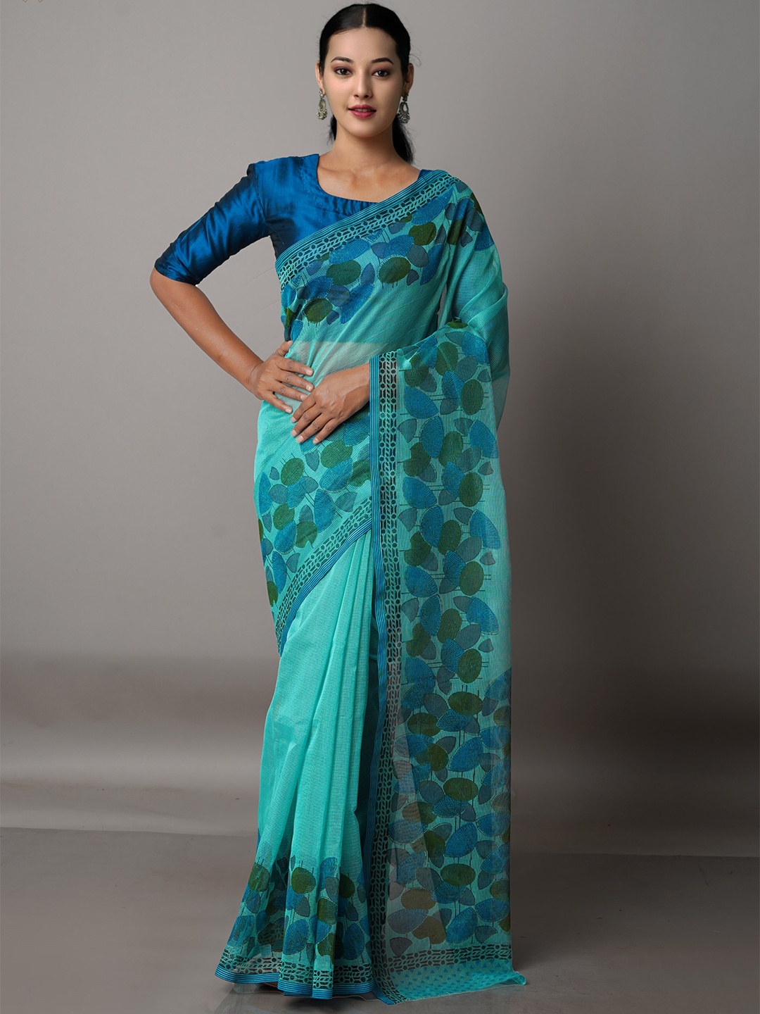 

Unnati Silks Green & Blue Floral Block Print Silk Cotton Saree