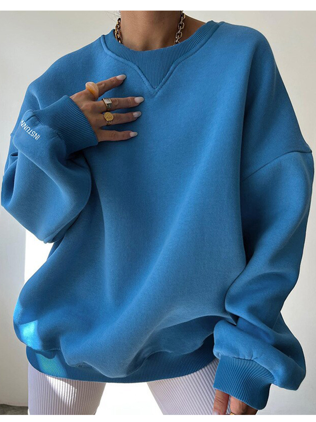 

BoStreet Women Blue Solid Drop Shoulder Sweatshirt