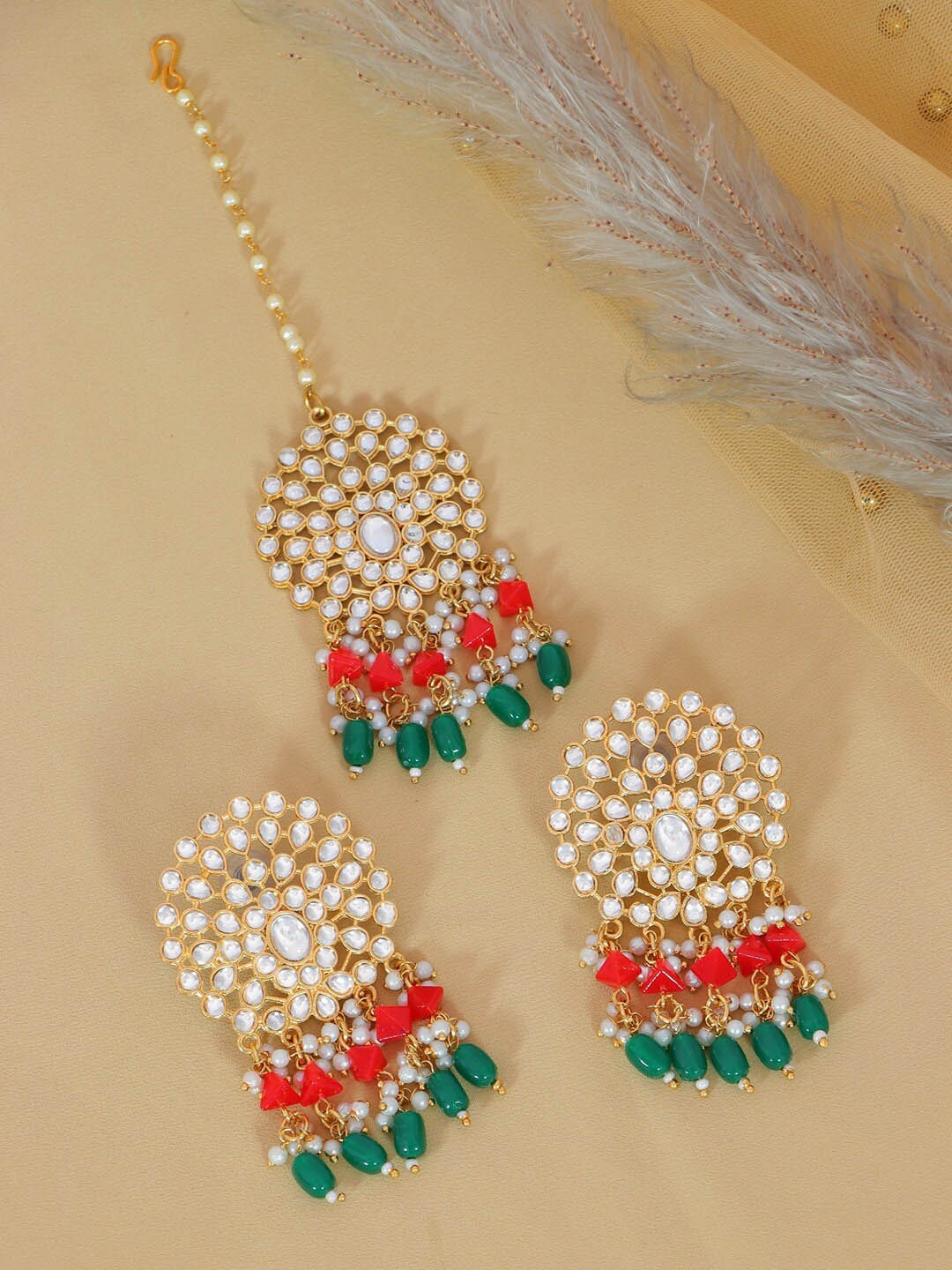 

Crunchy Fashion White & Green Gold-Plated Kundan Maang Tika and Earrings