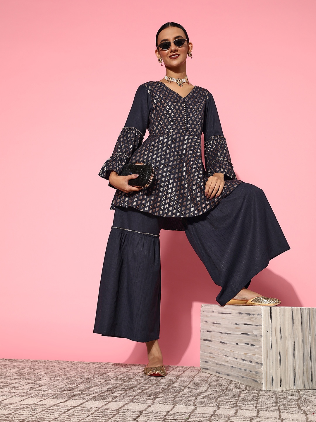 

Yufta Women Navy Blue & Golden Printed Peplum Kurta & Sharara Set
