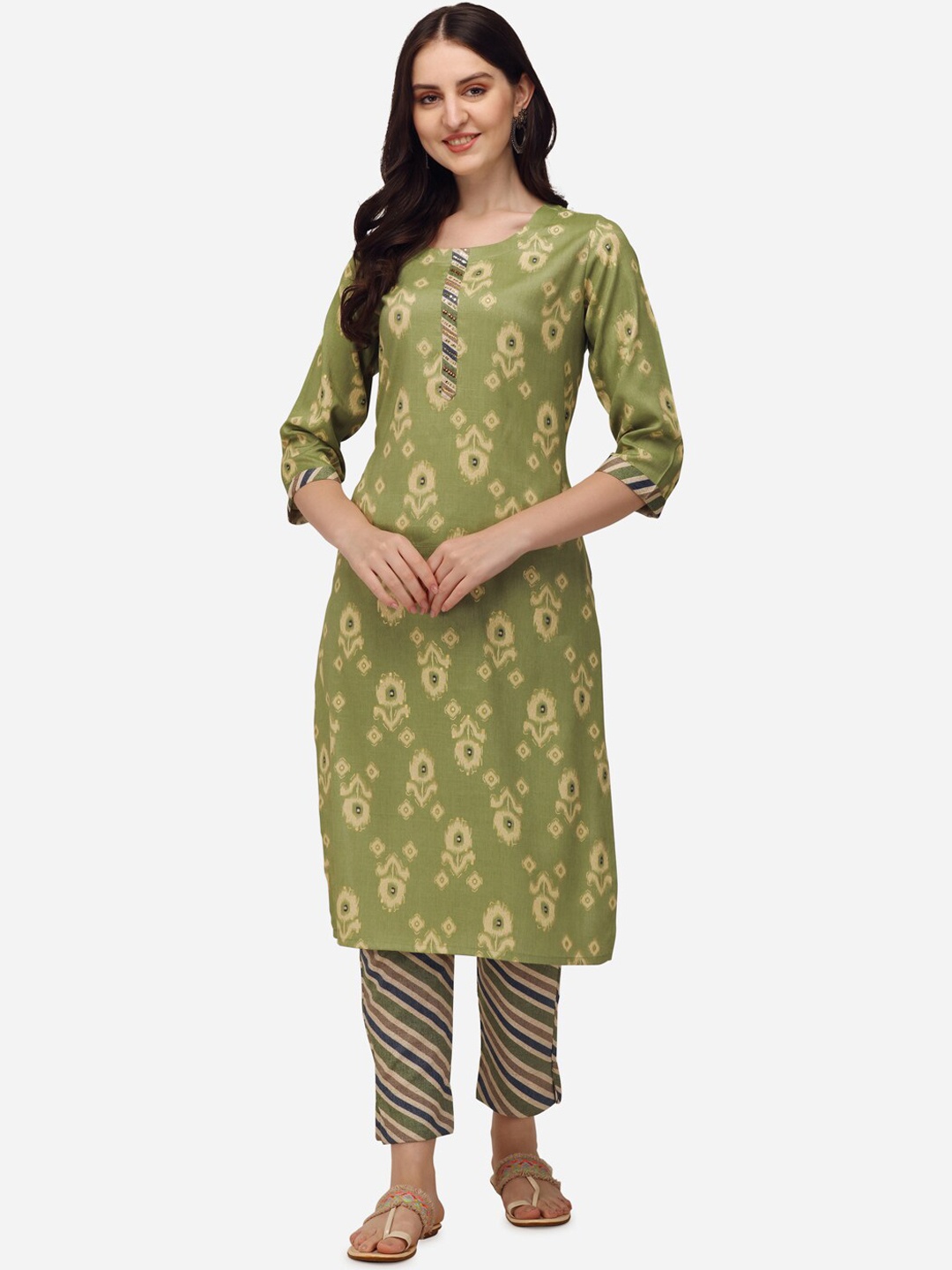 

Pure 9 Women Green Floral Printed Kurta with Trousers