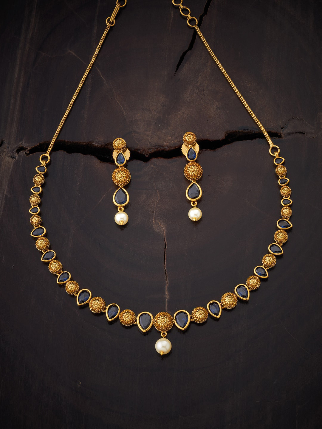 

Kushal's Fashion Jewellery Women Gold Plated Blue Stone Studded & Beaded Jewellery Set