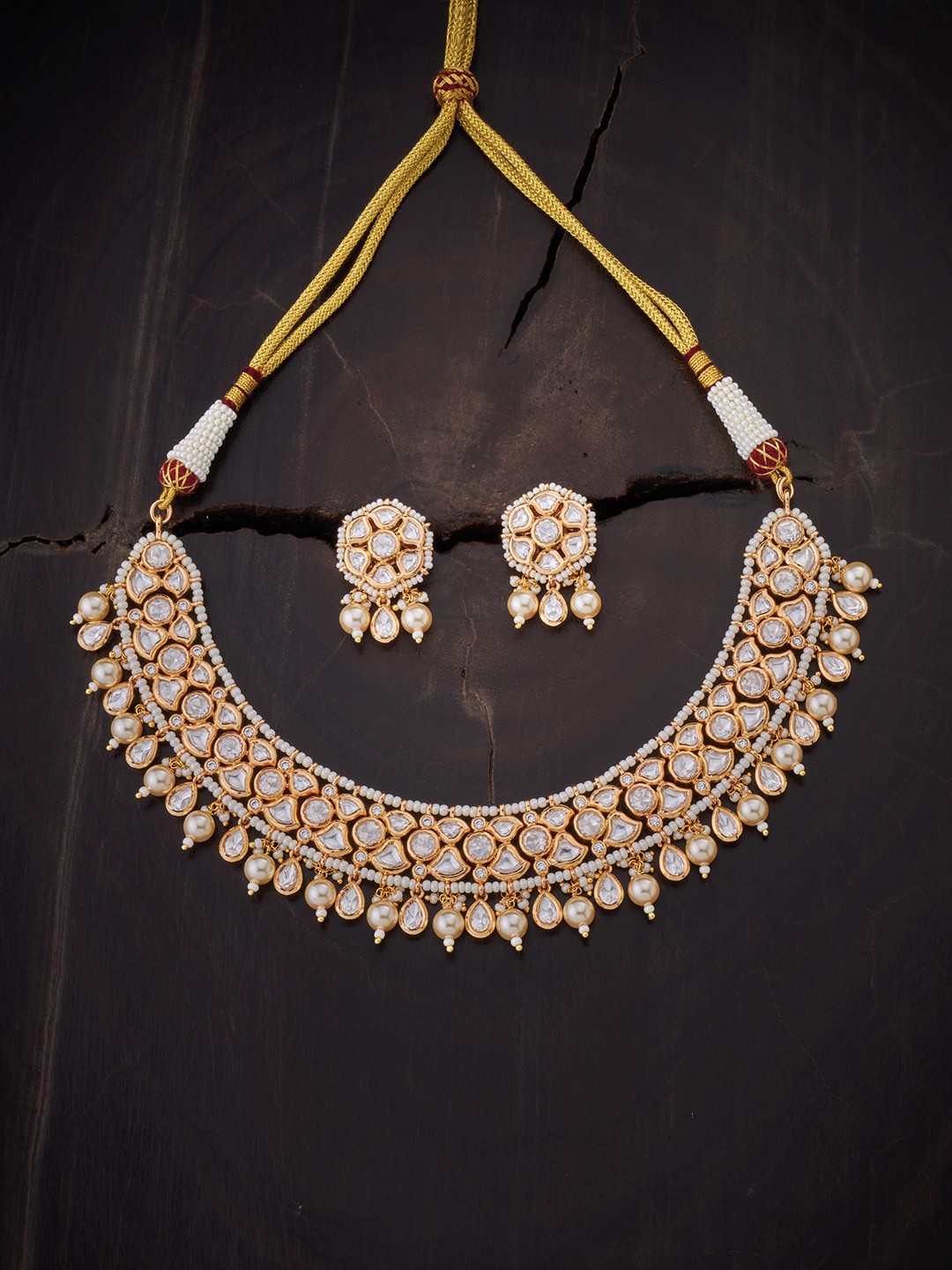 

Kushal's Fashion Jewellery Women Gold Plated White Kundan-Studded Jewellery Set