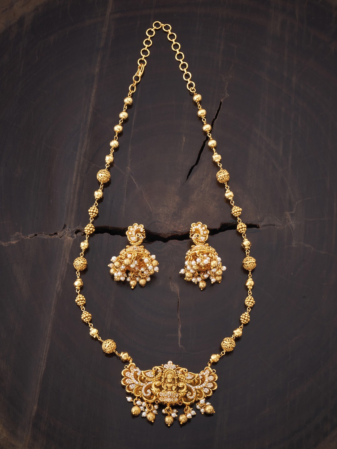 

Kushal's Fashion Jewellery Gold-Plated White Stone Studded & Beaded Jewellery Set