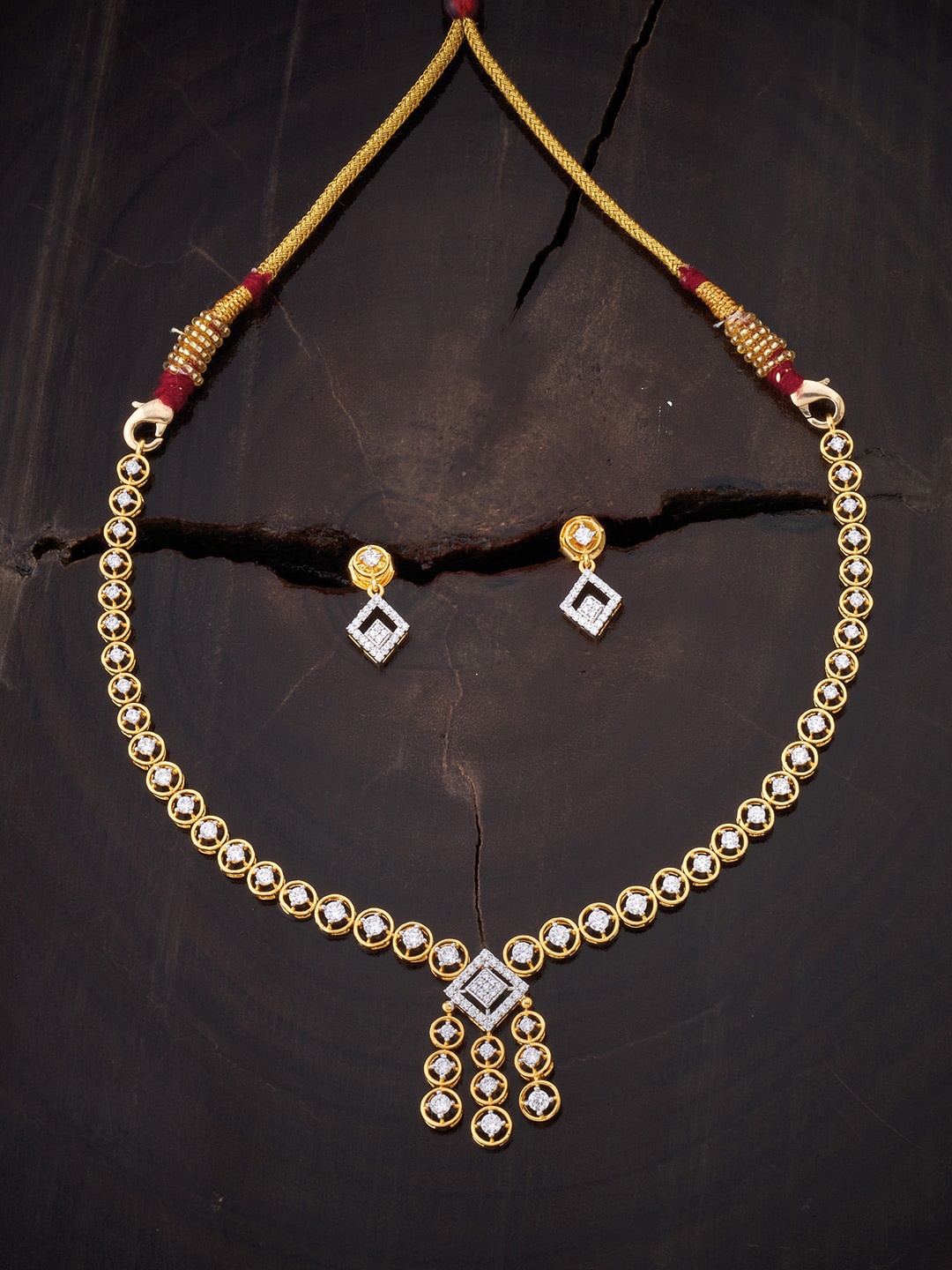 

Kushal's Fashion Jewellery Gold-Plated White Stone Studded Jewellery Set