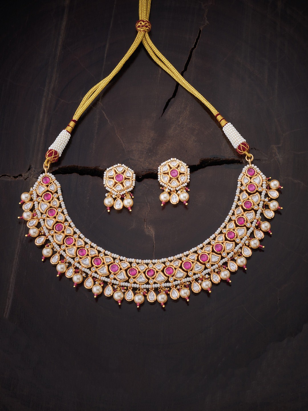 

Kushal's Fashion Jewellery Gold-Toned & Red Kundan Studded Jewellery Set