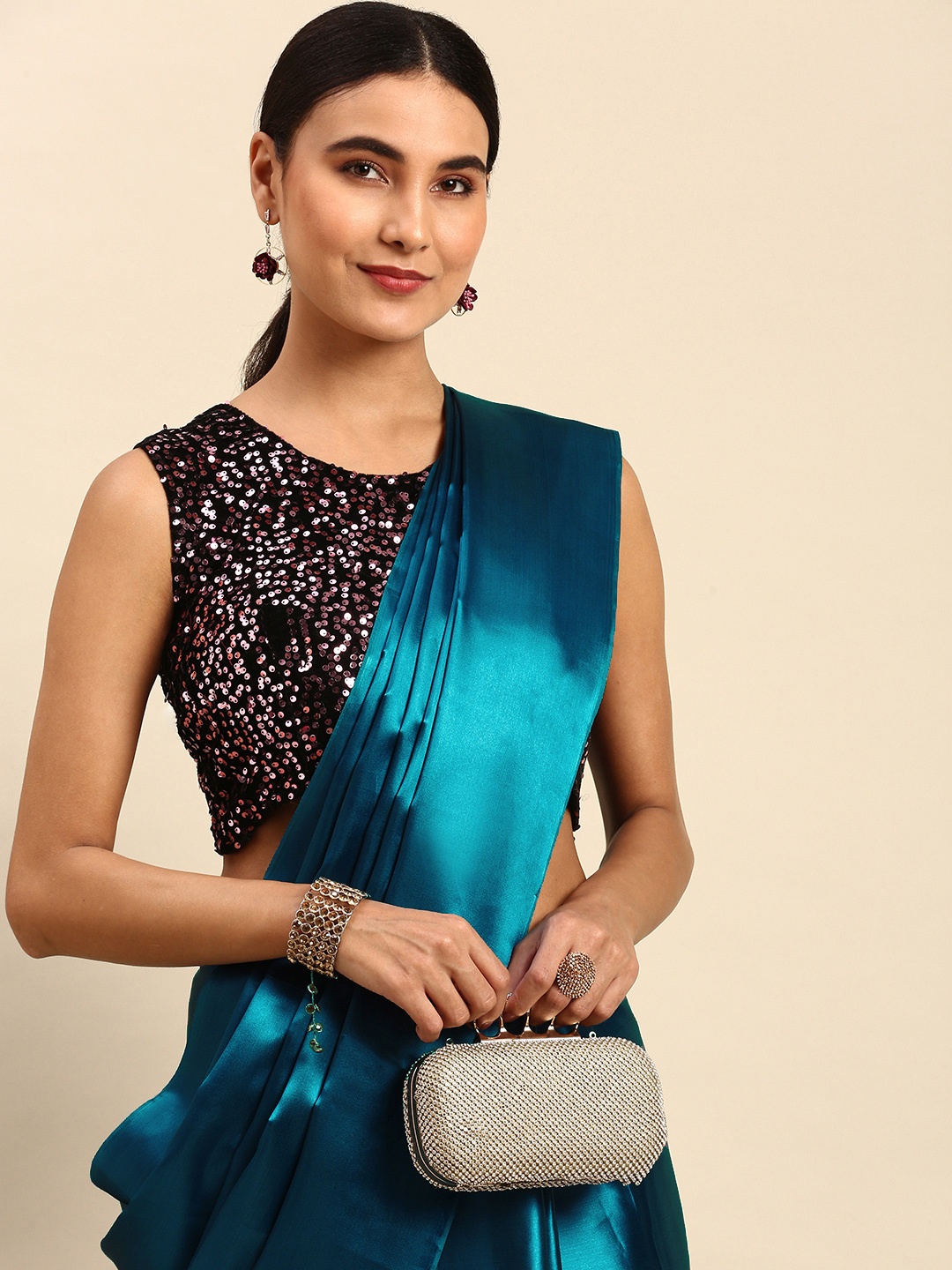 

TORONFRAS Teal Blue Solid Satin Bomkai silk Saree