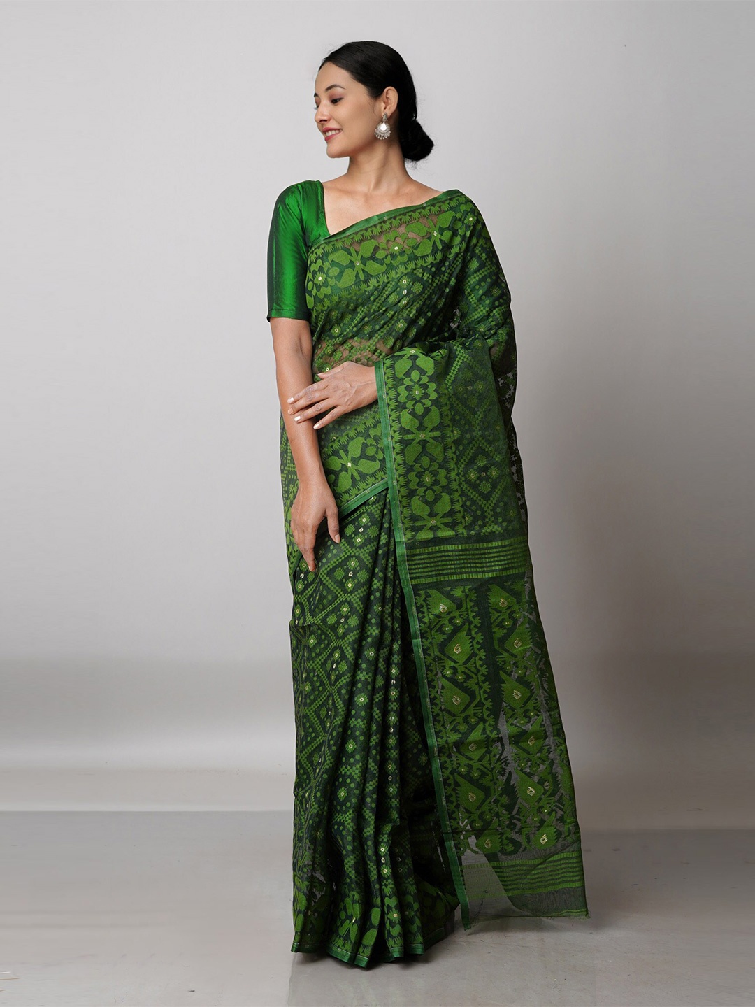 

Unnati Silks Green Woven Design Pure Cotton Jamdani Saree