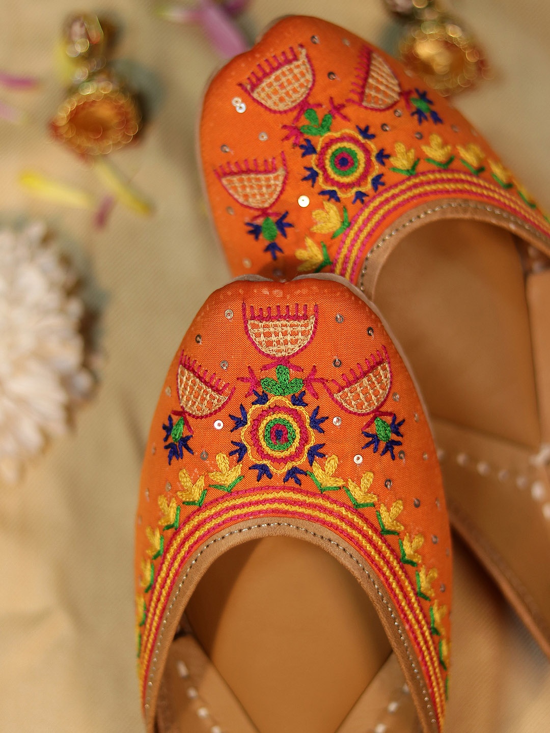 

GLAM STORY Women Orange Embellished Ethnic Mojaris with Embroidered Flats