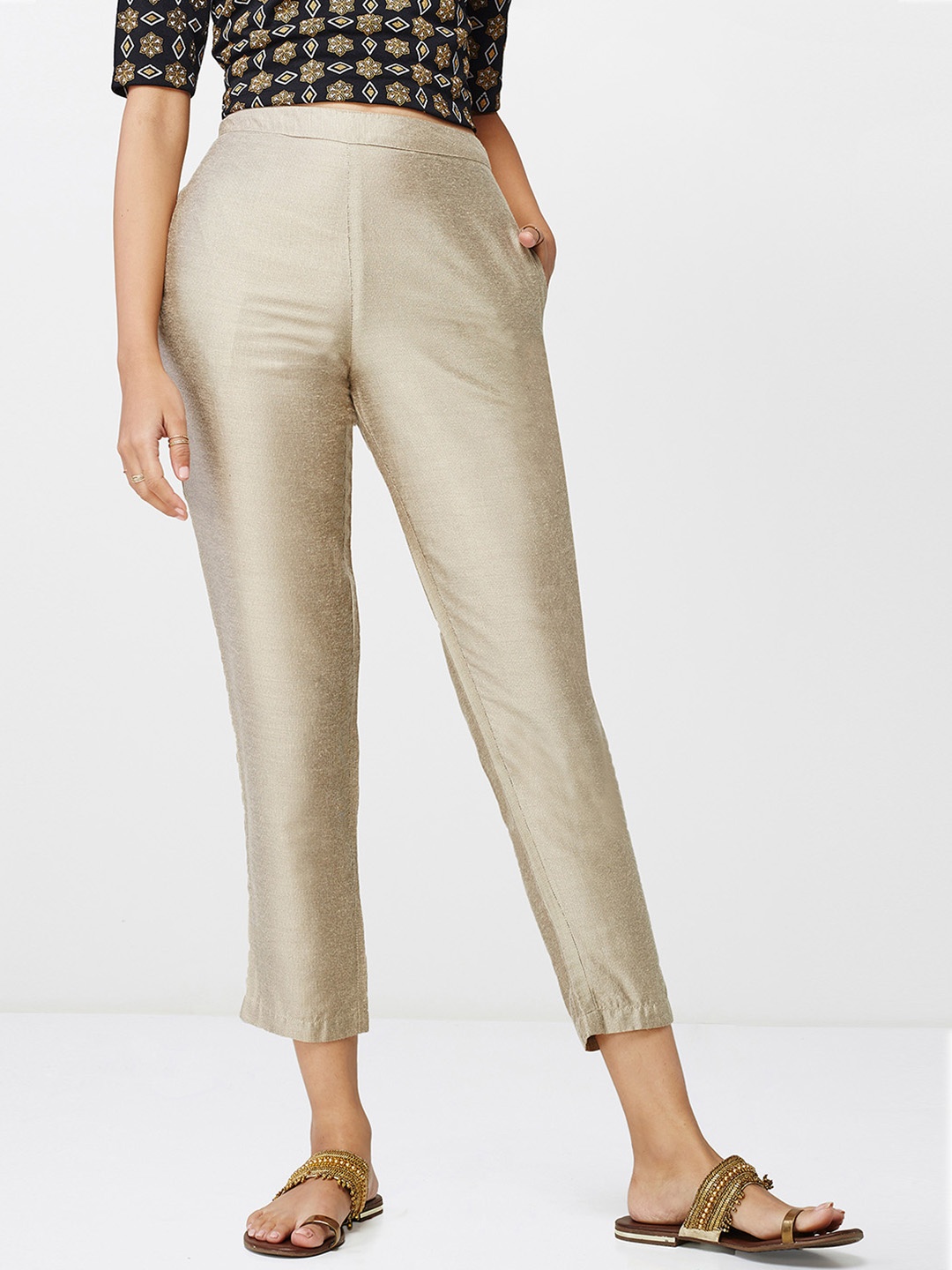 

Global Desi Women Beige Regular Fit Striped Cropped Regular Trousers