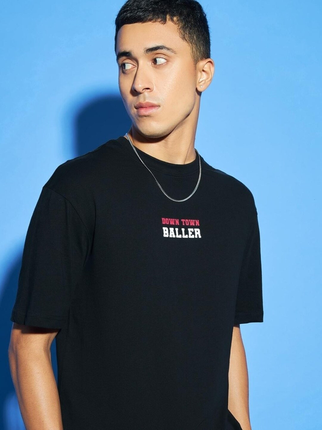 

Bewakoof Men Black Typography Printed Drop-Shoulder Sleeves Loose Cotton T-shirt