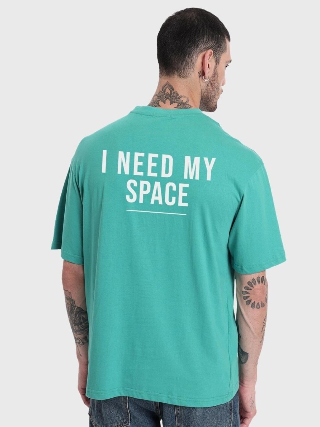 

Bewakoof Men Blue Typography Printed Drop-Shoulder Sleeves Loose Cotton T-shirt