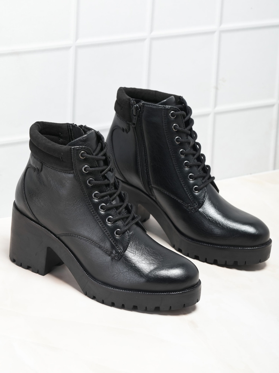 

MICHAEL ANGELO Women Solid Boots, Black