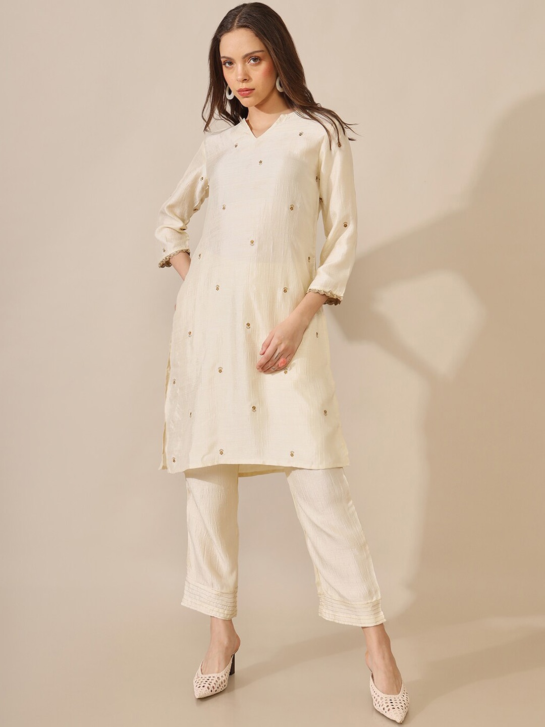 

Saaki Women White Ethnic Motifs Embroidered Kurta with Trousers