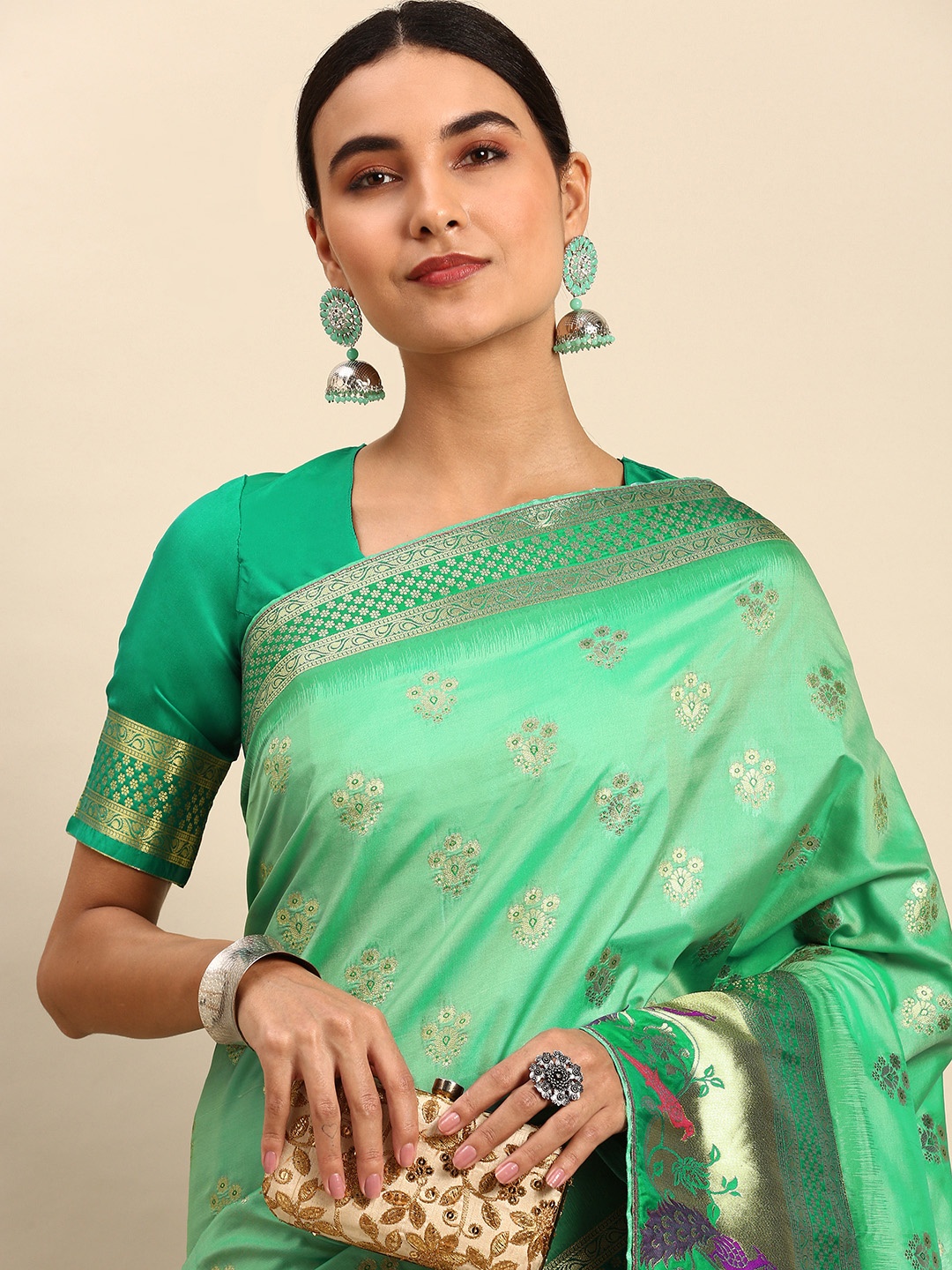 

HEEPOSH Green & Golden Ethnic Motifs Art Silk Banarasi Saree