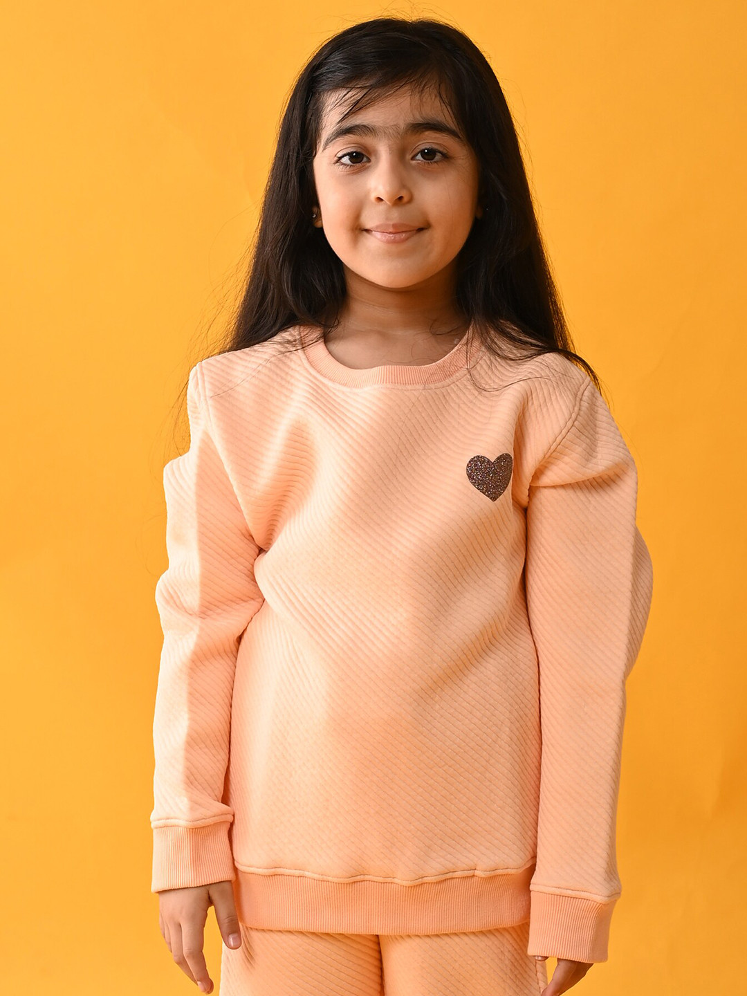 

Anthrilo Girls Peach-Coloured Solid Sweatshirt