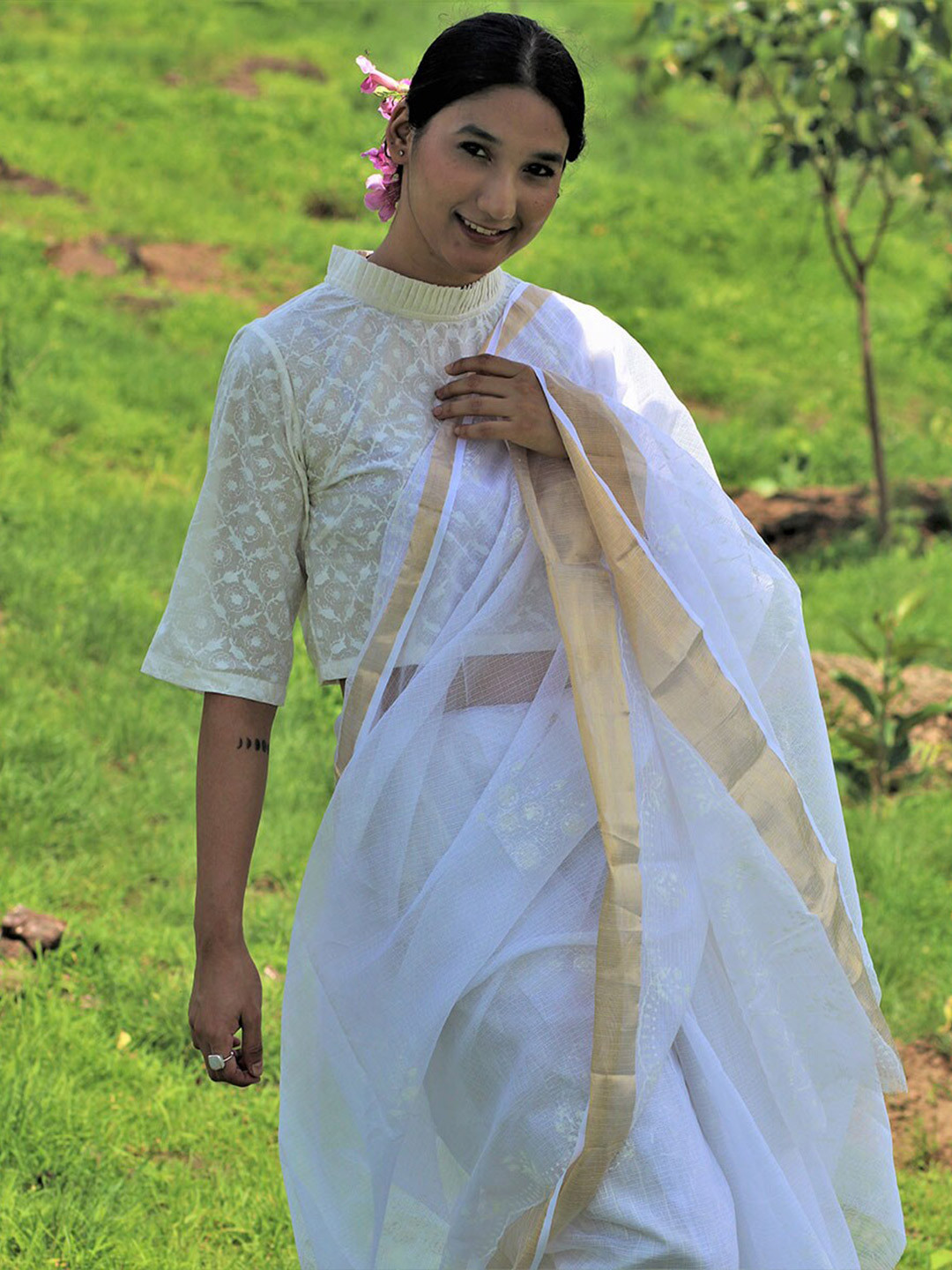 

Chidiyaa White & Gold Woven Design Zari Pure Linen Saree