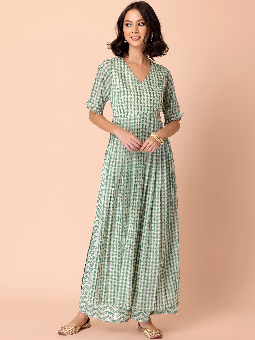 

INDYA Women Green Floral Printed High Slit Kurta with Palazzos