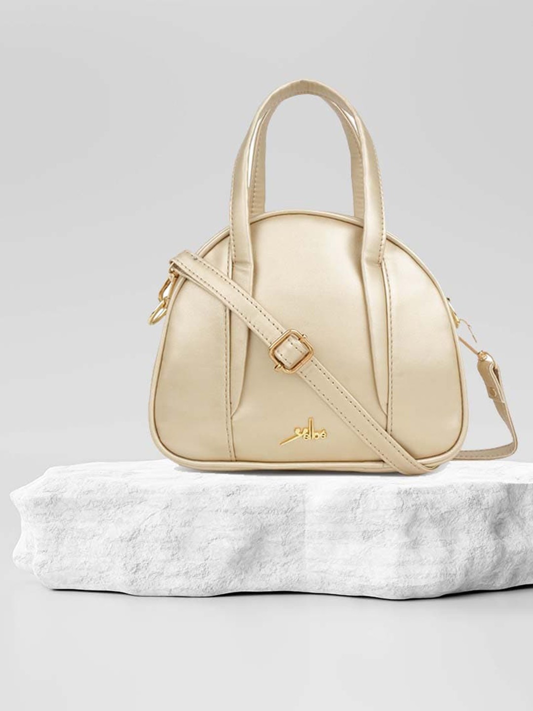 

yelloe Women Gold-Toned Structured Handheld Bag