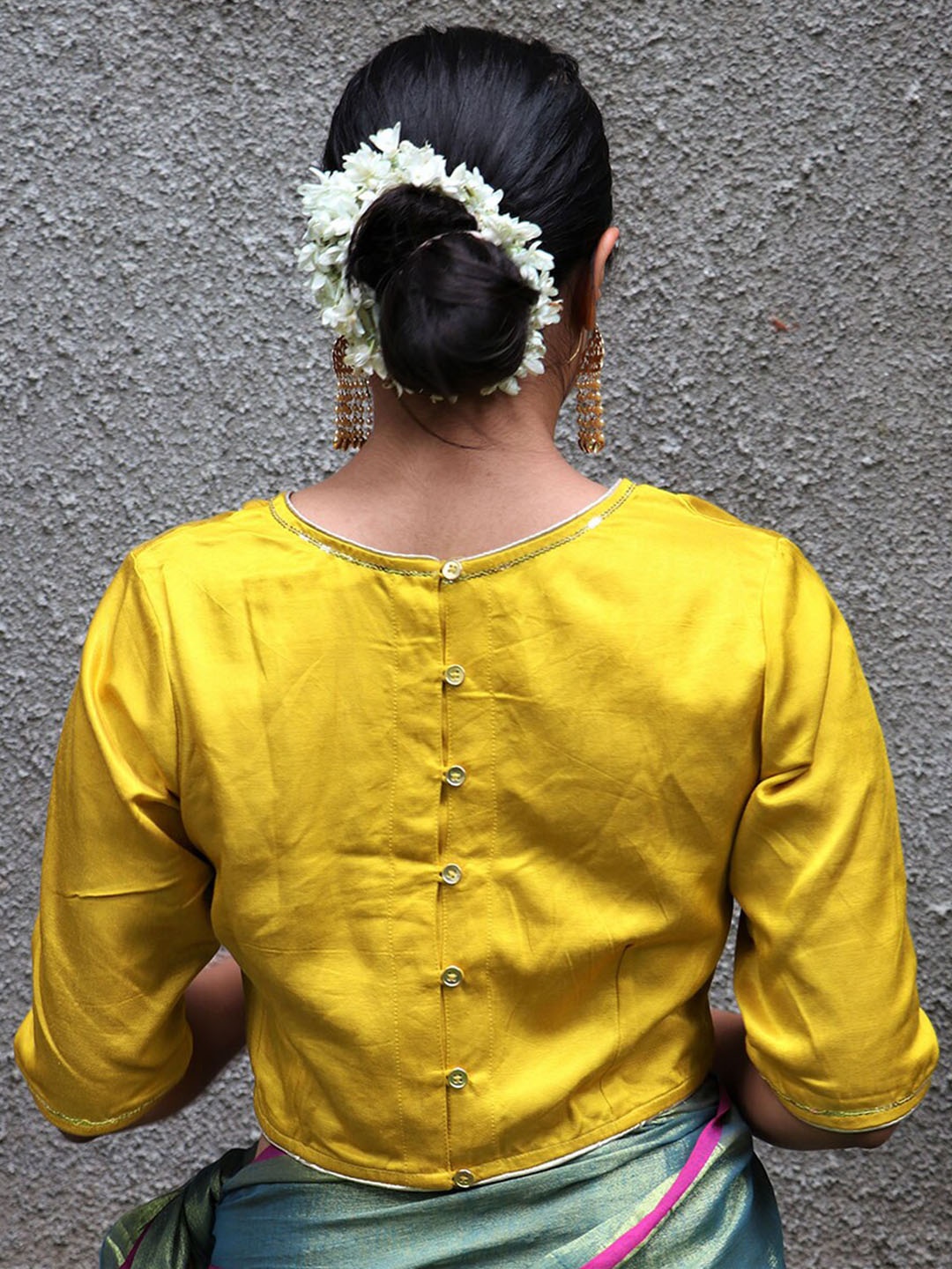 

Chidiyaa Women Yellow Embroidered Silk Saree Blouse