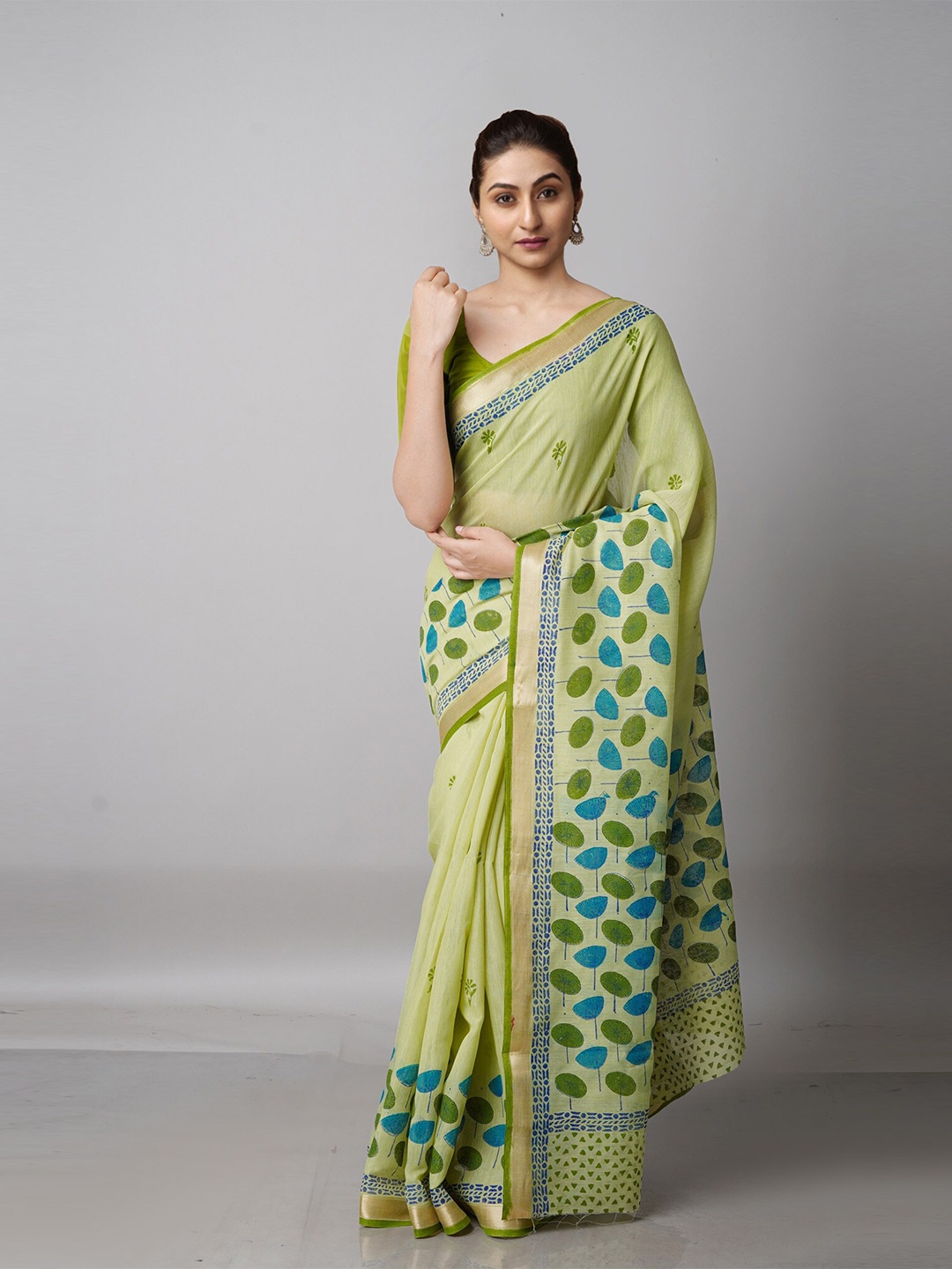 

Unnati Silks Green & Blue Ethnic Motifs Block Printed Mangalagiri Zari Saree